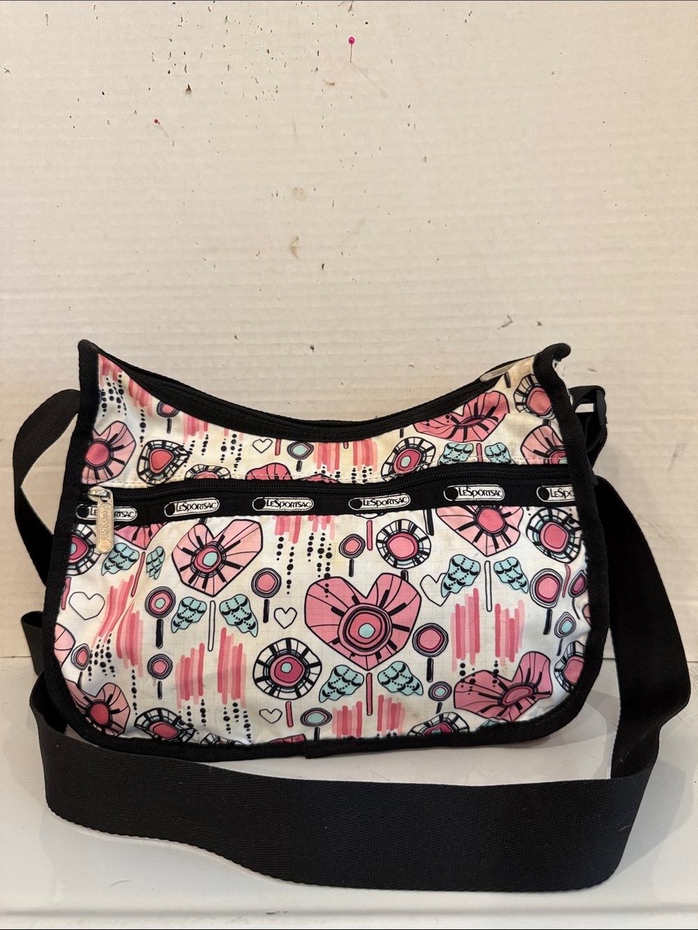 Lesportsac Pink and Cream Graphic Crossbody Bag